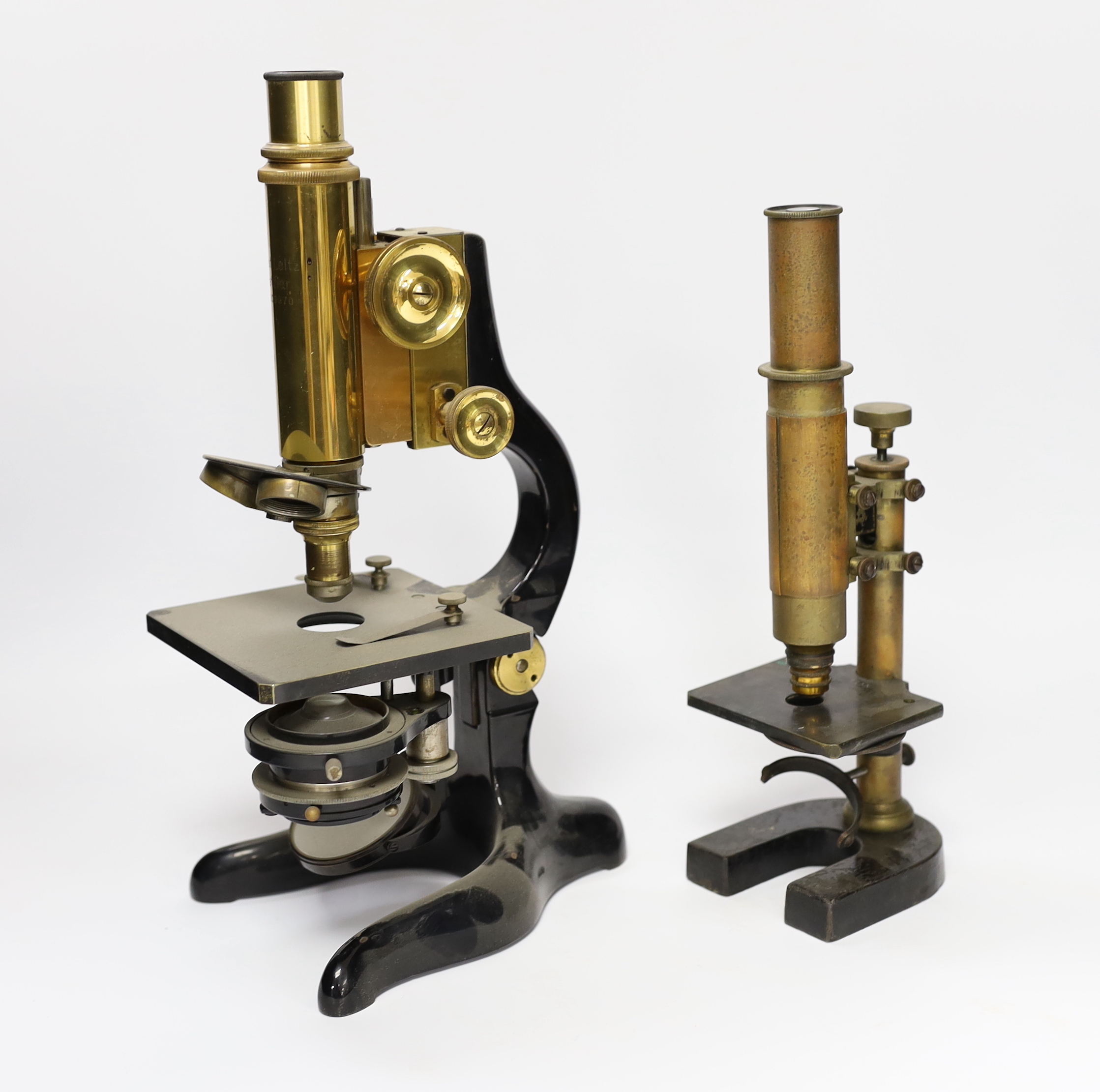 Two cased Leitz Wetzlar microscopes, largest 30cm high